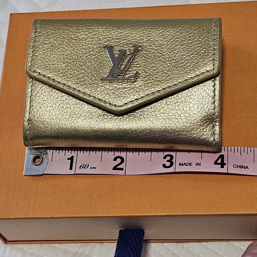 LOUIS VUITTON Portefeuille lock mini Compact Wallet Trifold Leather